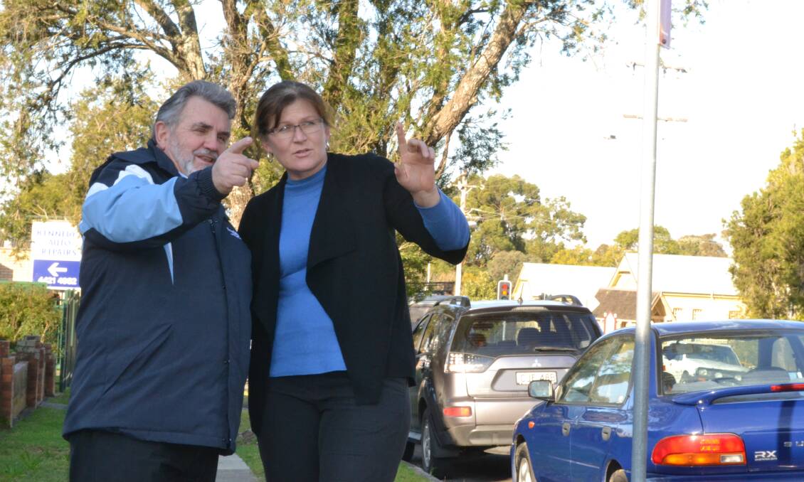 ROAD WARRIORS: Outgoing NRMA director Alan Evans and new director Kate Lundy discuss road issues during their fact finding visit to Nowra.