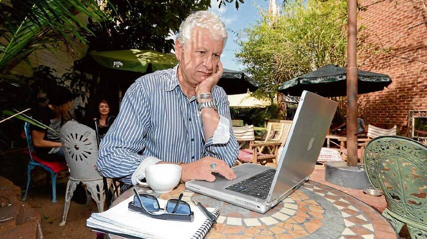 POOR SERVICE: Attila Kaszo pictured in a 2012 southcoastregister.com.au story struggling with slow internet speeds. Three years later nothing has changed.