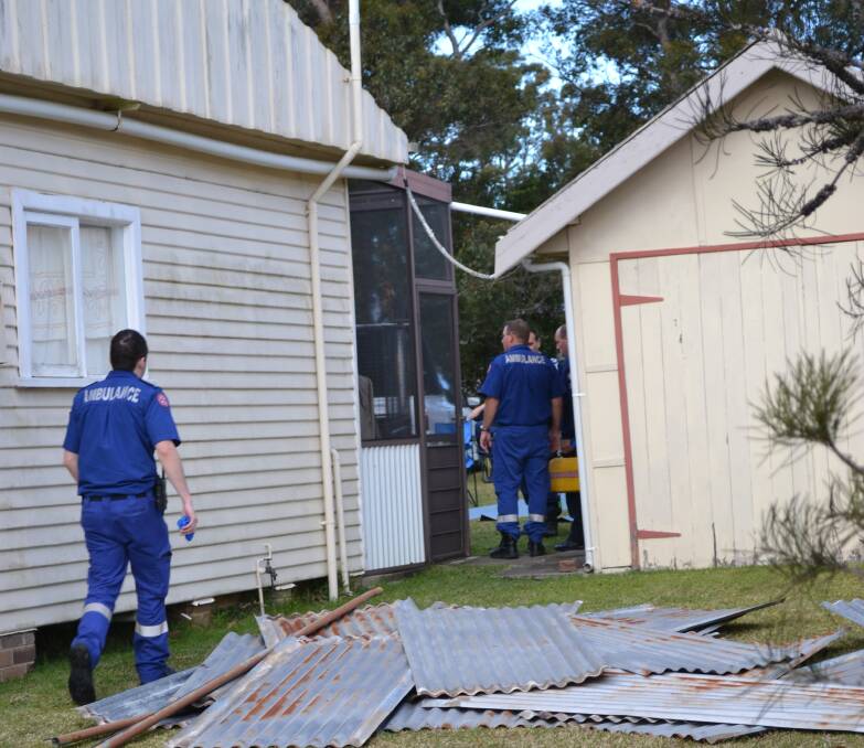 TRAGEDY: Police at the scene of Sunday’s fatal roof fall at Sussex Inlet.