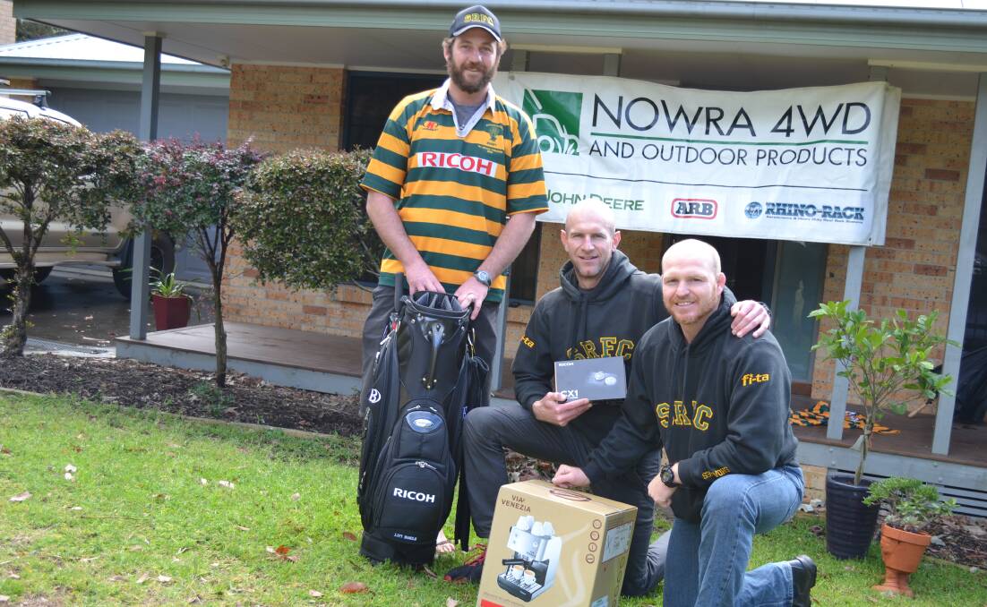 PACKING DOWN: Michael Johnston front with Chad Fraser and Mick Horton who are helping to organise a golf day for his injured brother Joe.