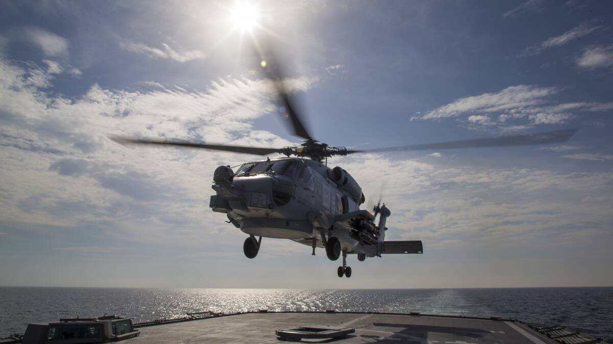 A MH-60R Seahawk takes off from the flight deck on HMAS Ballarat. Photo: Defence. 