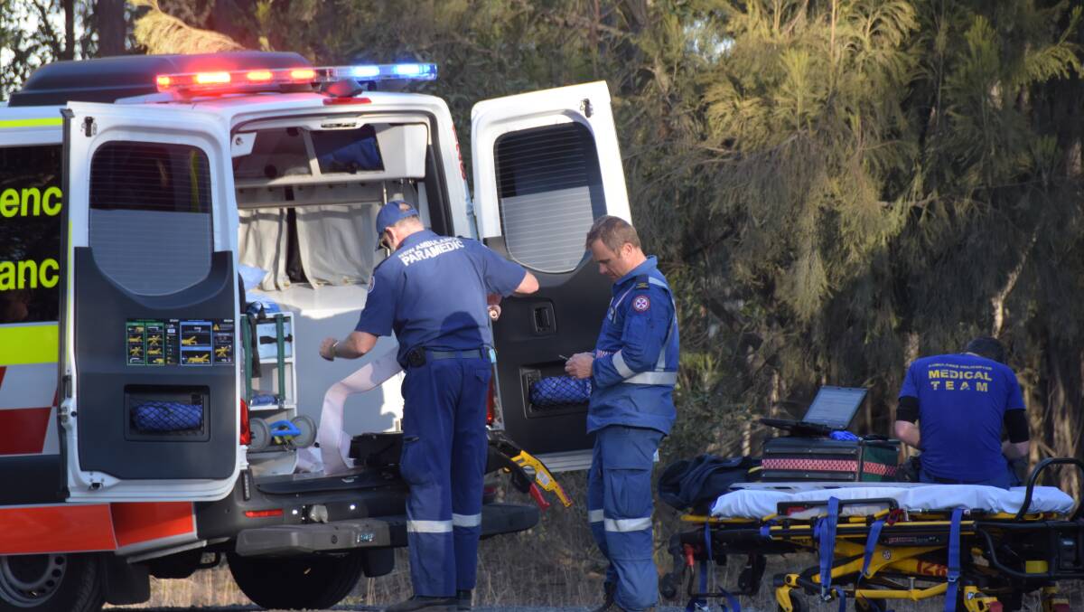 Emergency services on the scene of the fatal motorcycle accident at Yerriyong, west of Nowra.
