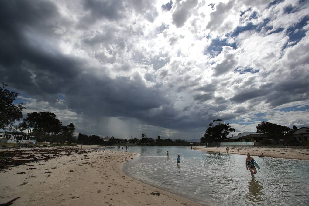 A storm rolls over Little Lake at Barrack Point on Saturday. Picture: Adam McLean