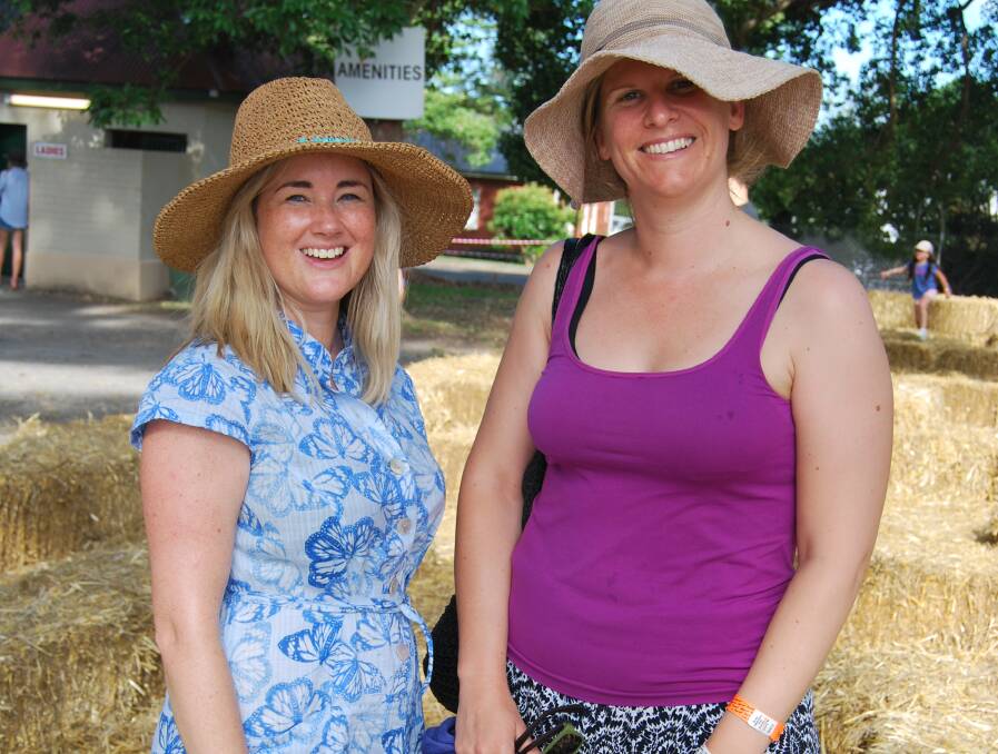 HAY THERE: Clare Cameron and Carolyn Frewer enjoy the Fairgrounds Festival at the Berry Showground held last weekend.