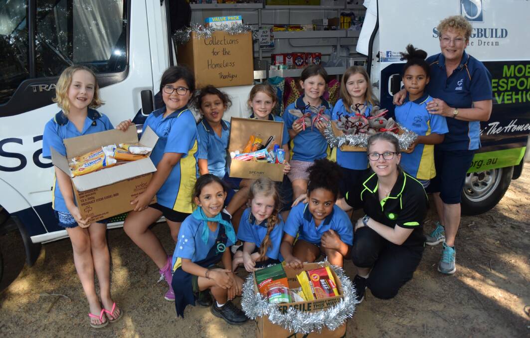 The North Nowra Gumnut Guides with their great donations which will assist people in need.