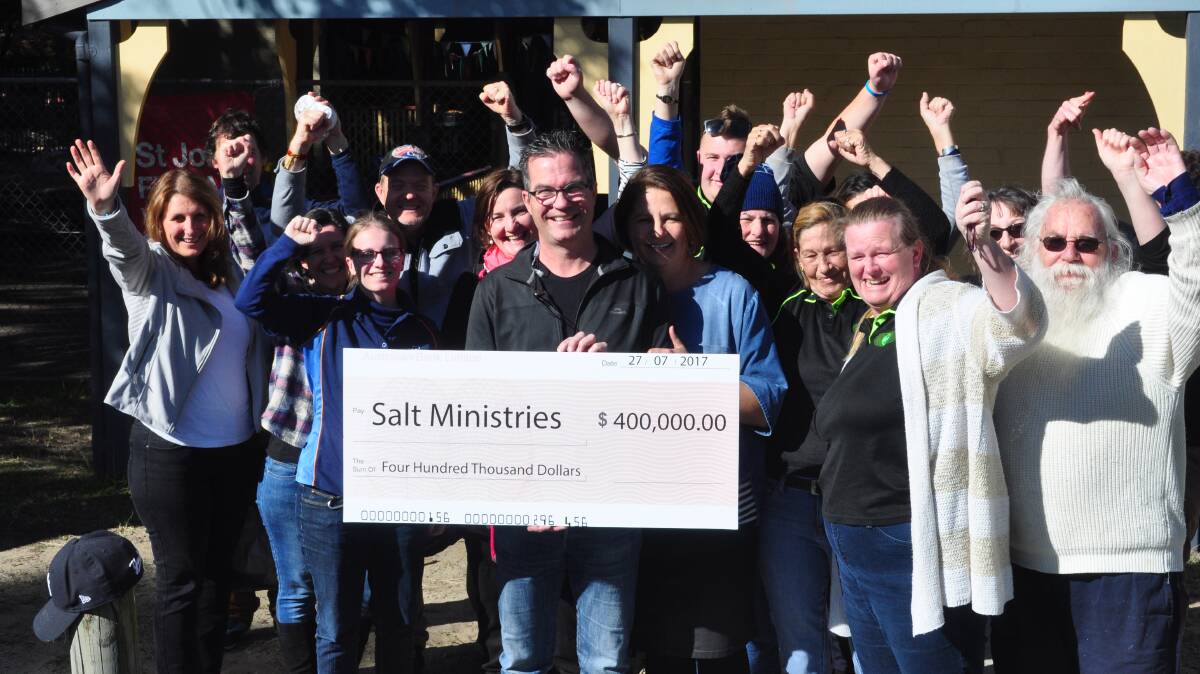 CHEERS: Salt Ministries celebrate as Pastor Peter Dover announces the huge donation.