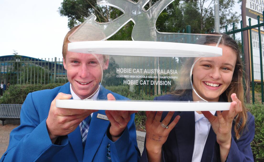 Kyle Fortier and Bonnie Butler with the trophy they won at the recent CHS regatta.