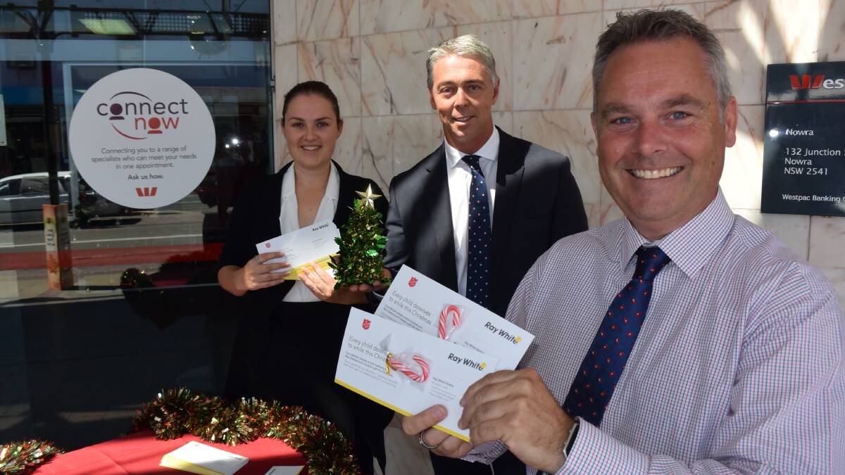 BETTER TO GIVE: Sarah Mackenzie, Craig Hadfield and Jamie Gossage spread the word about the Ray White Christmas appeal.
