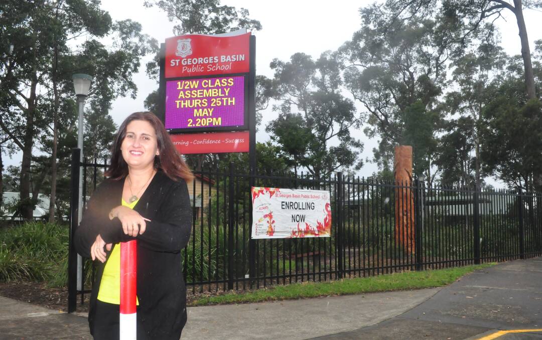 President of the St Georges Basin Public School's Parents and Citizen President Tracy Mandavy loves the school's new fence.