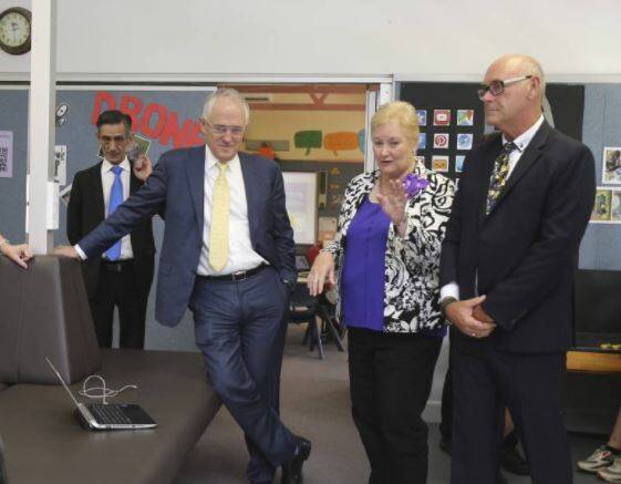 Jeff Ward with Prime Minister Malcolm Turnbull and Federal Member for Gilmore Ann Sudmalis.