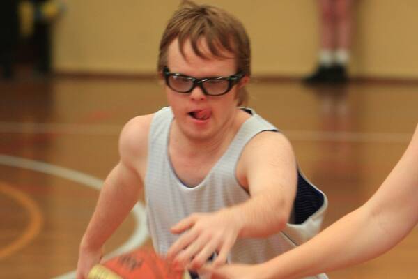 STORMING THROUGH:  Mark Jansen powers down the court during one of the many basketball matches held at the Bomaderry Basketball Stadium over the weekend as part of two full days of NSW Special Olympics action.