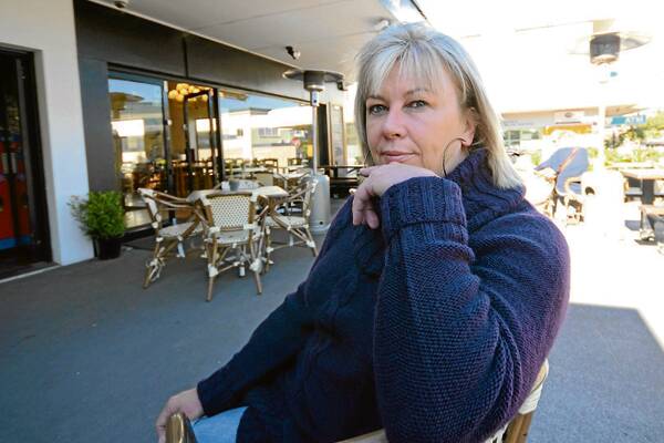 SOLDIERING ON: Cafe owner Robyn Crawford says if the people of Nowra want their town to look presentable, they need to unite against vandals.