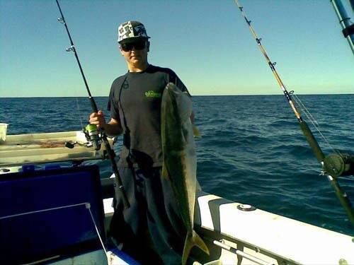 SOLID CATCH: Josh Pakes with an 11 kilogram kingfish..