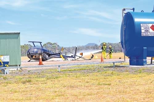 WRECKED: A gust of wind is believed to have caused a helicopter to flip on its side while trying to take off at Moruya airport.