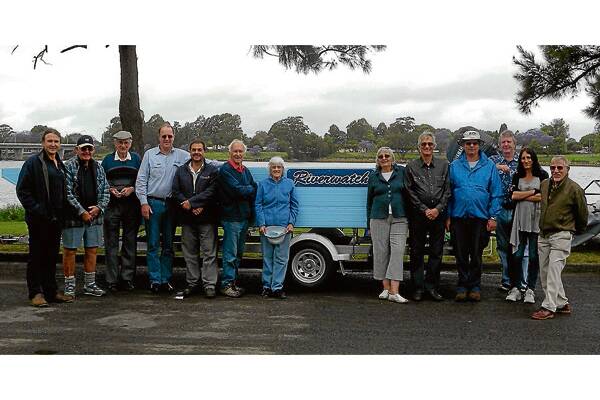 CRUISING: Riverwatch members, Southern Rivers Catchment Management Authority (SRCMA) staff and visitors pictured with the new boat from left Chris Presland, Charlie Weir, Les Chittick, Noel Kesby, Eric Zarrella, John Downey, Frieda Weir, Patricia Mason, John Tate, Tony Jennings, Warren Bruce, Yvonne Mason and Sydney Mason.
