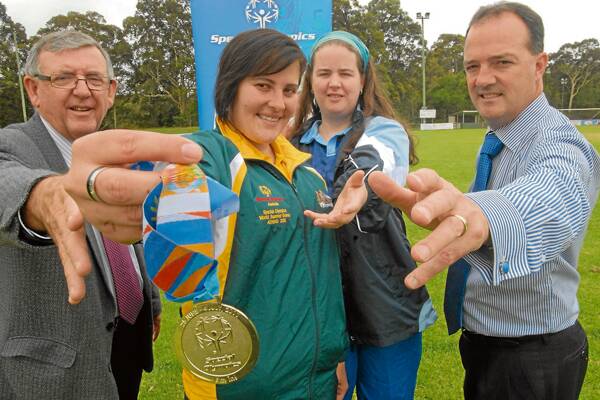 WINNING MOVE: Special Olympics NSW chairman Peter Wren, Special Olympics basketball gold medallist Lisa Keen of Mount Warrigal, NSW Special Olympics basketballer Tahlia Henson of Kiama, and Shoalhaven Mayor Paul Green all going for gold.