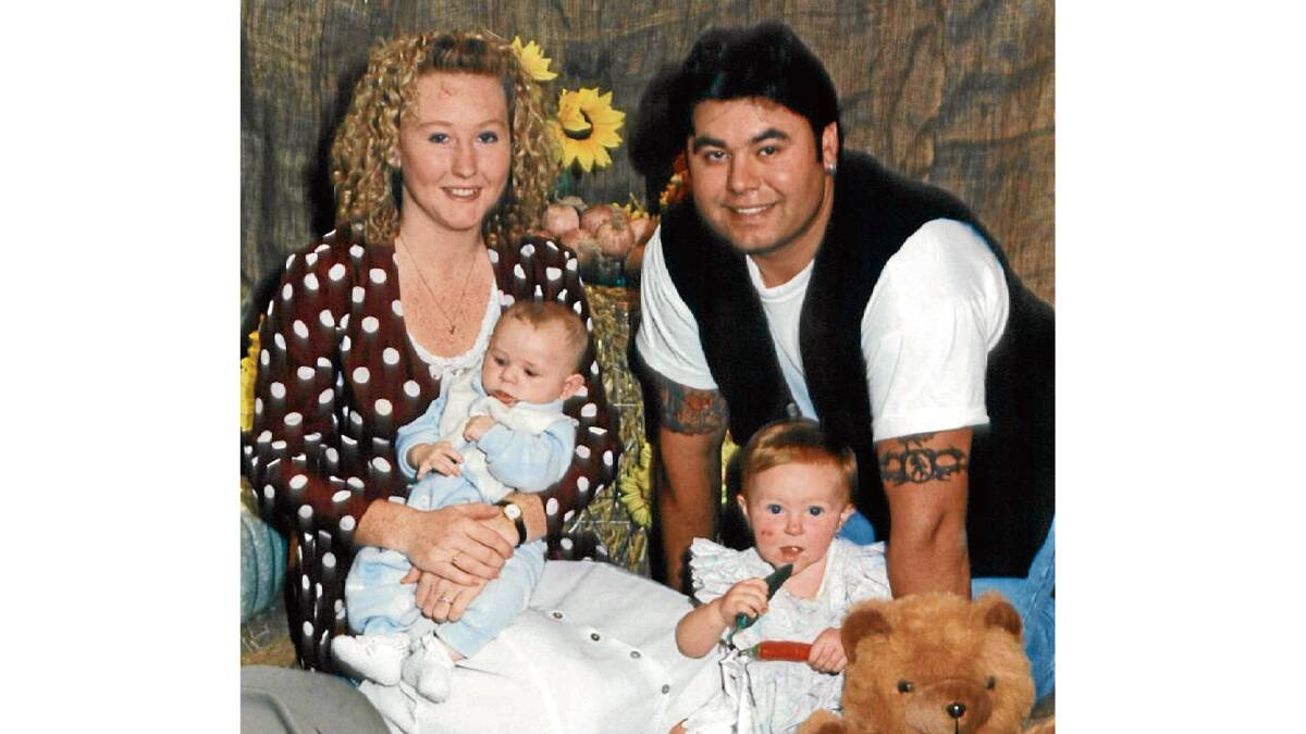 MYSTERY: Jodie Fesus with her husband and children shortly before she disappeared and her body was found in a shallow grave 16 years ago.