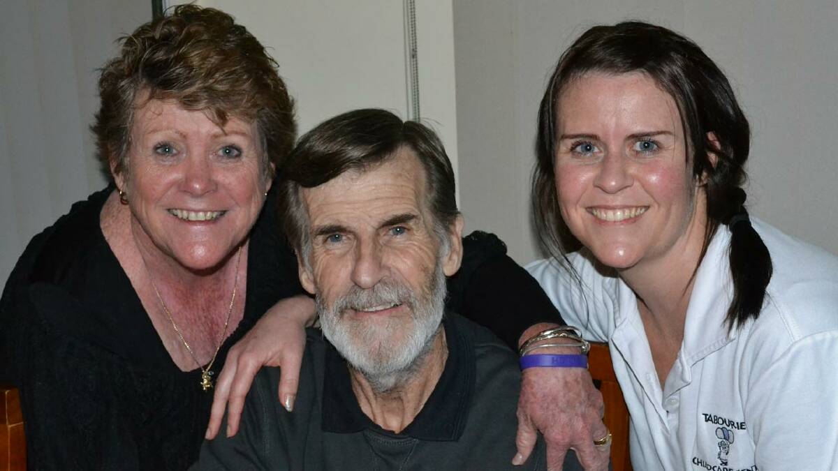 HAPPY FAMILY: Kay Hodge and Sharon Clear are delighted to have their husband and father Dennis Hodge back at home after a marathon operation removed a huge tumour and several organs from his abdomen.