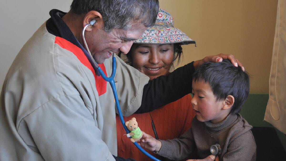 CHECKUP: Nowra based paediatrician Dr Mark de Souza examines a local child.