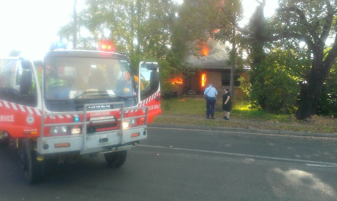 Firefighters attend the house fire in North Nowra 