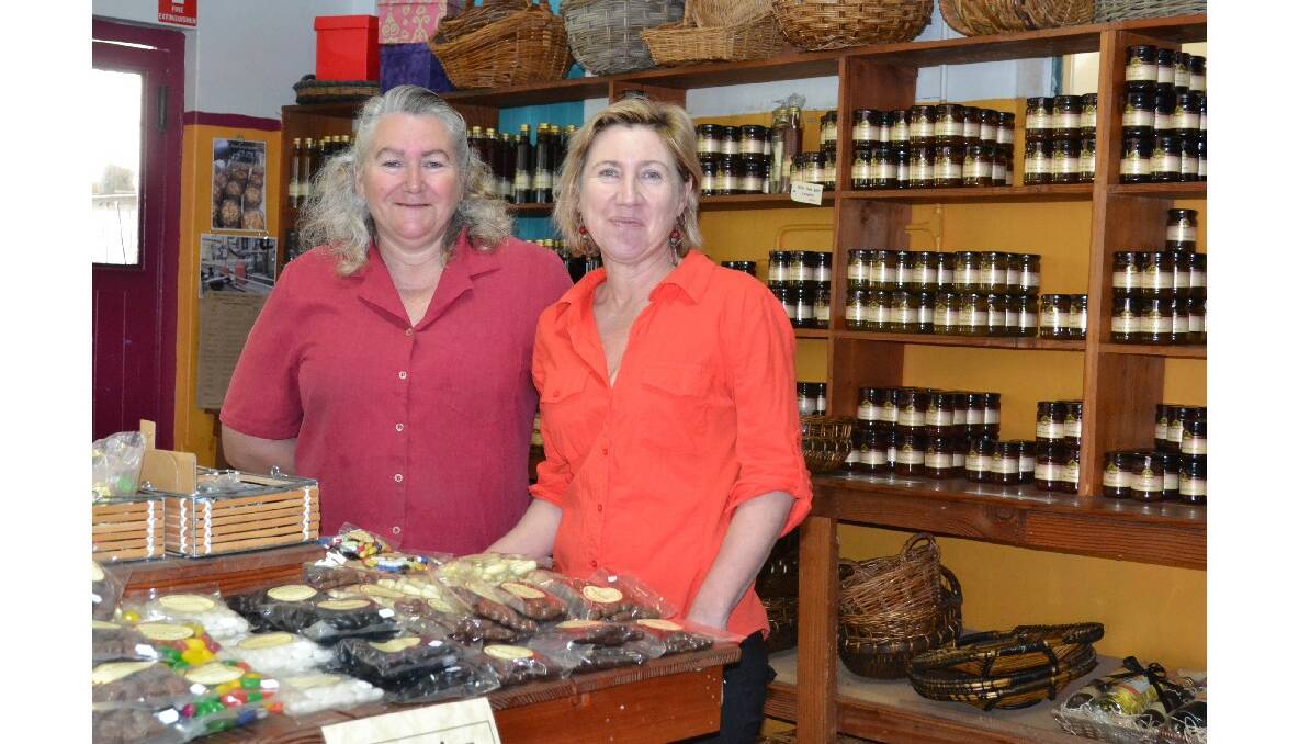 Julie Southgate and Karin Maxwell from Berry Treat Factory, among the store’s tasty products.