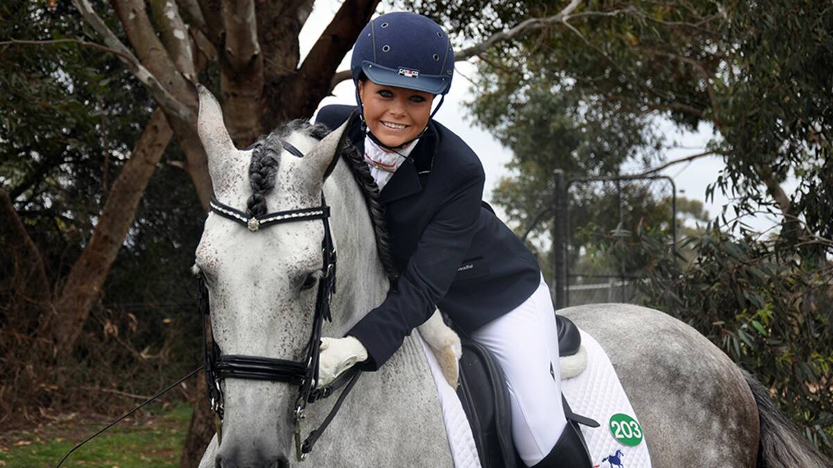 FEEL THE LOVE: Victoria Davies is a powerhouse atop her horse Andaluka Elegido, also known as Eddie.