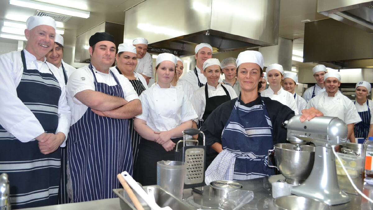 SWEET: French pastry chef Severine Meillard (centre) passes on some of her knowledge to Nowra TAFE’s Tourism and Hospitality students.