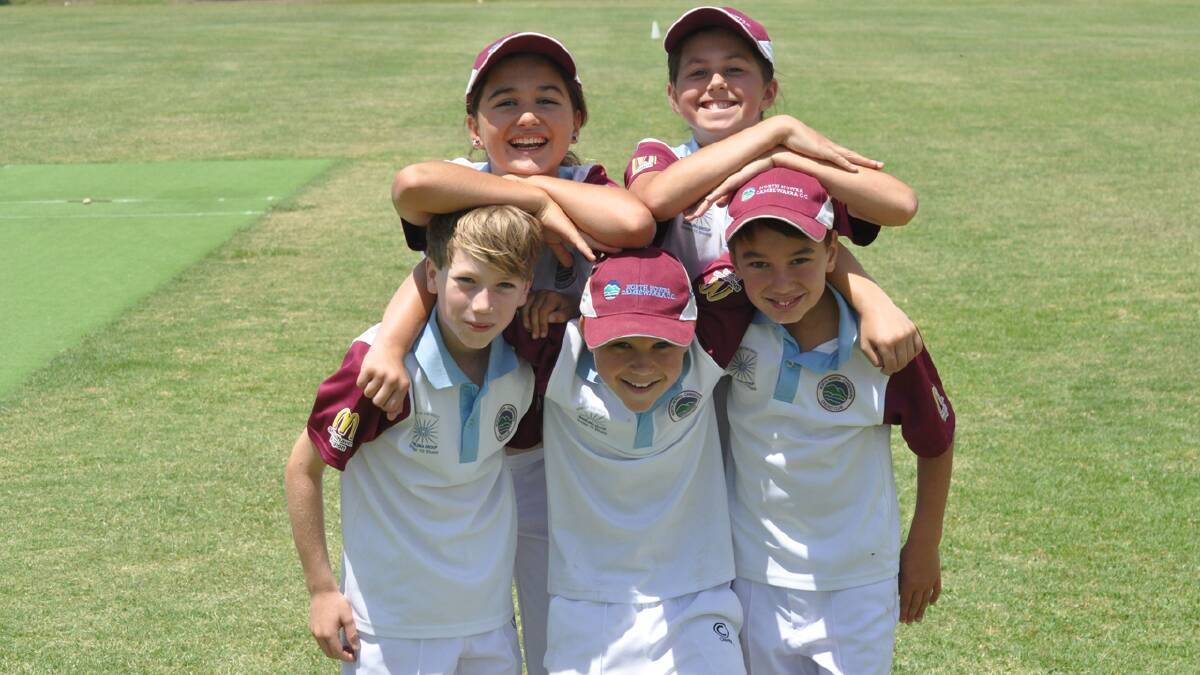 CAUSE FOR CELEBRATION: Marley Arthur (front left) celebrates his success with his teammates (back) Tayla Dunn and Ella Davidson and (front) Brodie Arkinstall and Jasper Dunn.	 Photo: PATRICK FAHY 