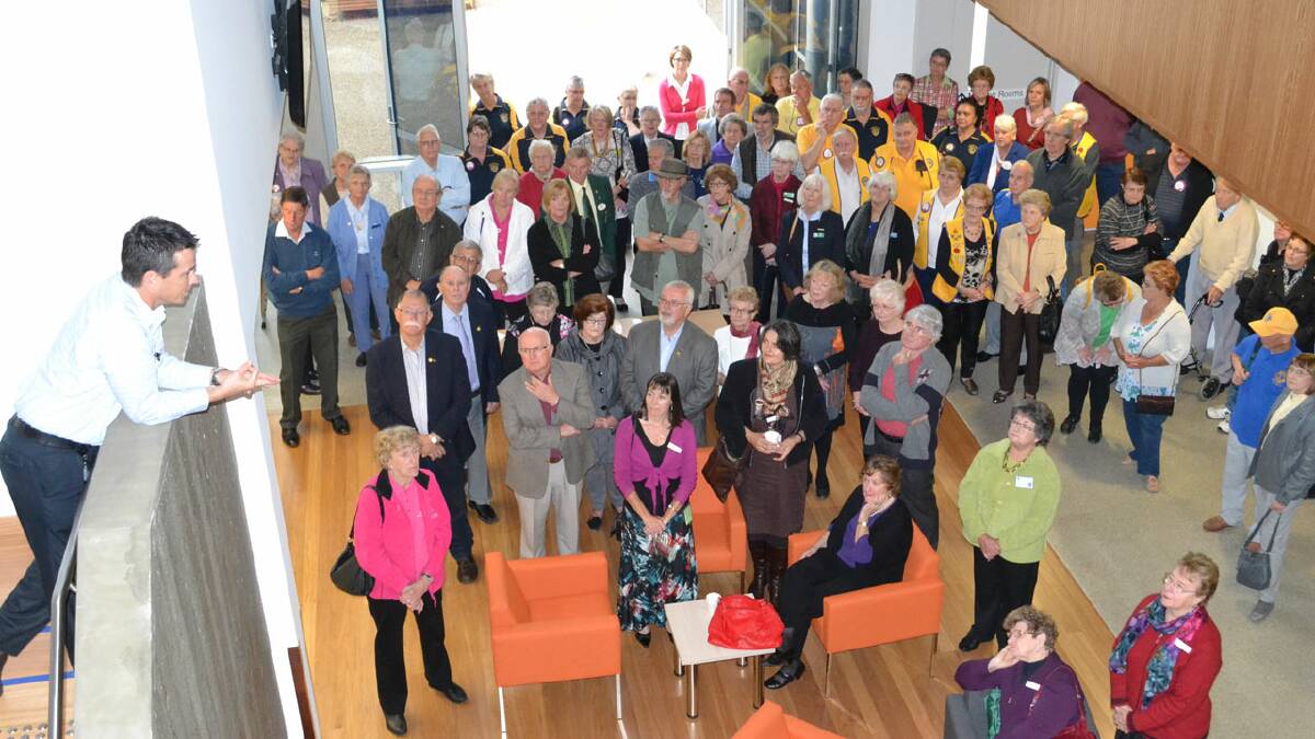 PROUD: Director of Cancer Services Anthony Arnold talks to the local community fund-raisers who toured the $35 million Shoalhaven Cancer Care Centre on Monday.