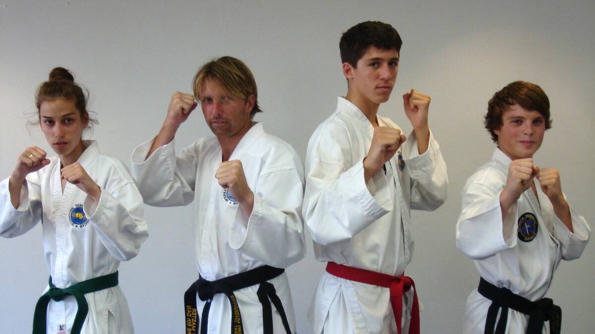HARD HITTERS: Tanea Ruttley, Paul Daniels, Lachlan Capmer and Lucas Logan prepare for the 2014 ITF Taekwondo World Titles. 