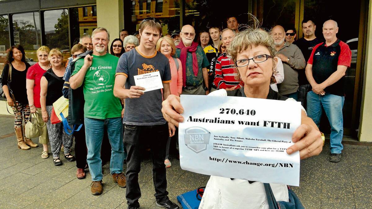 LOUD AND CLEAR: Cyndy Vogelsang was one of 30 people who delivered a petition to Member for Gilmore Ann Sudmalis yesterday calling for Fibre-to-the-home internet.