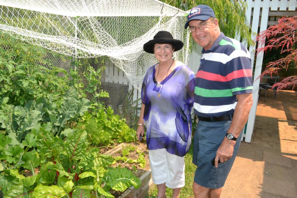 Pam and Phil Crocker from The Arbour Berry enjoy garden number four at the Berry Garden Festival on Saturday.