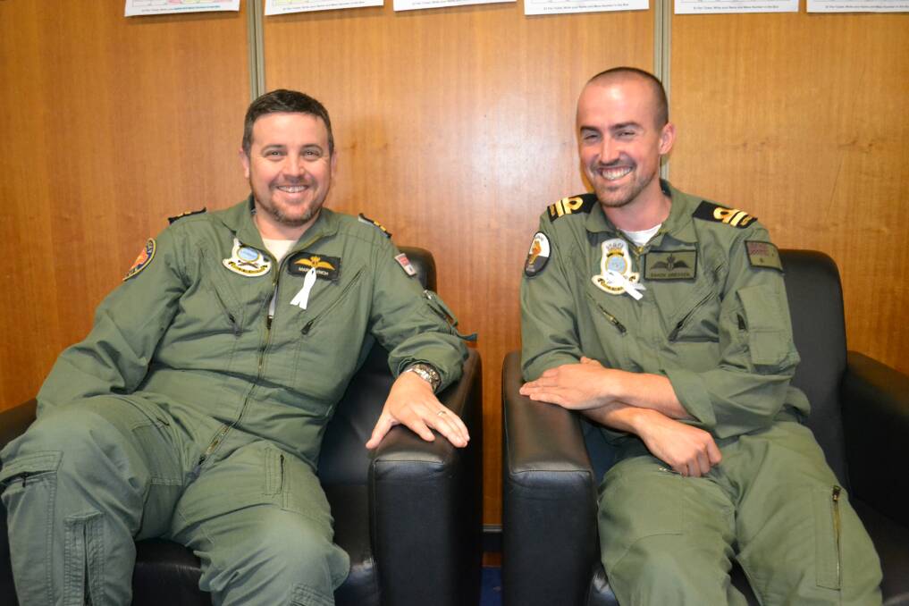 SUPPORT: Mark Lynch and Michael Driessen at the HMAS Albatross White Ribbon Day morning tea on Monday.