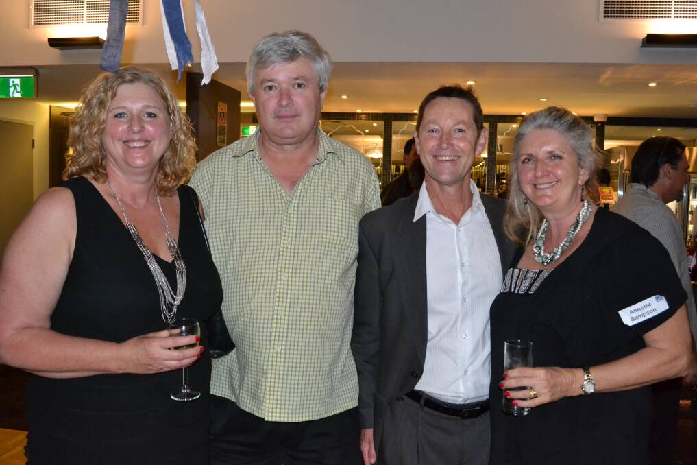 GREAT TIME: Michele Carse and Tony Busjak from Wollongong, Andrew Copp from Canberra and Annette Sampson-Benn from Huskisson have a great time at the Nowra High School 50th birthday reunion at Bomaderry Bowling Club on Saturday night.