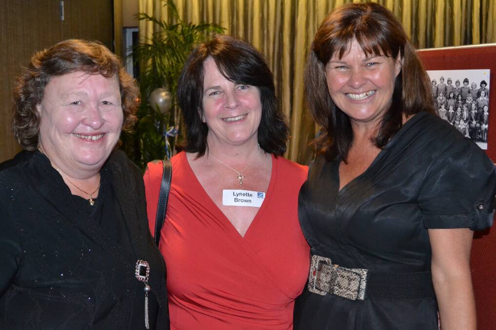 REMEMBER WHEN: Beth Gehrig from Vincentia and Lynette Brown from Perth and Kerry Roberts from Sydney reminisce on old times at the Nowra High School 50th birthday reunion at Bomaderry Bowling Club on Saturday night.