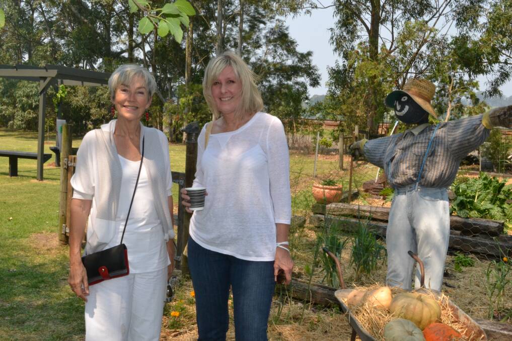 Annie Mac from Berry and Jenny Ward from Sydney admire garden number two at the Berry Garden Festival on Saturday.