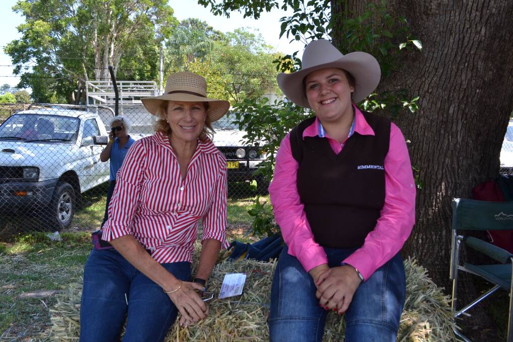 RINGSIDE: Catherine McGoldrick from Jaspers Brush and Danielle Scriberras from Londonderry relaxing in the shade at the Berry Show on Saturday.