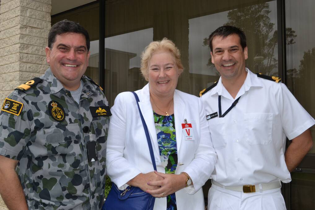 Commander Vince Di Petro and Sub Lieutenant Michael Lindo with Member for Gilmore Anne Sudmalis at the White Ribbon Day morning tea at HMAS Albatross on Monday.