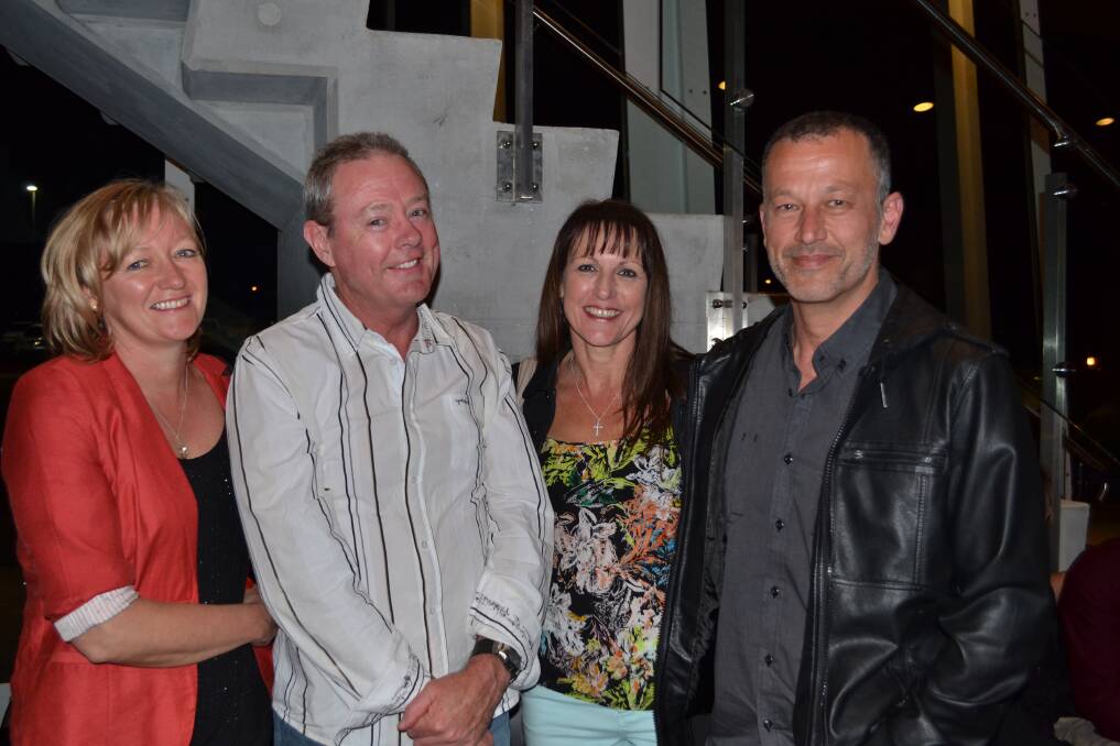 FRIENDLY BANTER: Jill Turnbull and Phil Costello from Kiama with friends Dawn Turnbull and Jim Gargas from Croydon at the Diesel concert at the Shoalhaven Entertainment Centre on Saturday night.