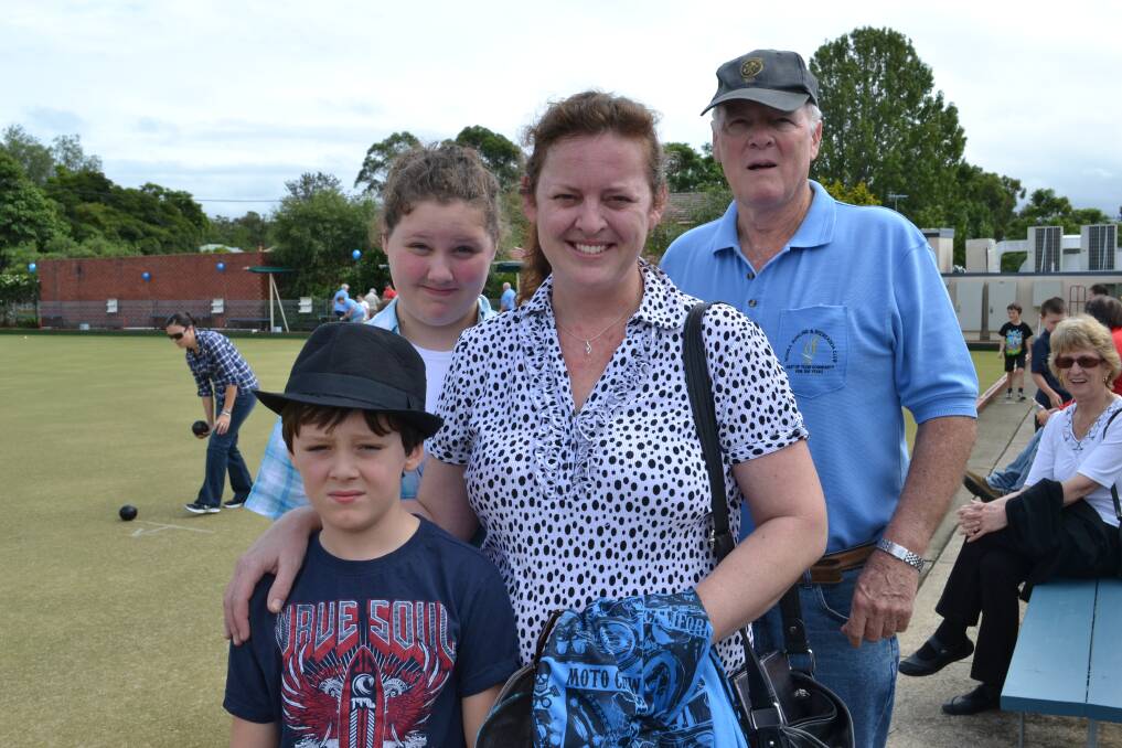 FAMILY AFFAIR: Ryan, Izzy and Kathy Walker with Tom Houldsworth from Nowra at the Nowra Bowling Club 100th Anniversary on Sunday.