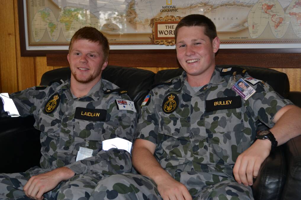 MATES: Jake Laidlaw and Joel Bulley support White Ribbon Day at HMAS Albatross on Monday.