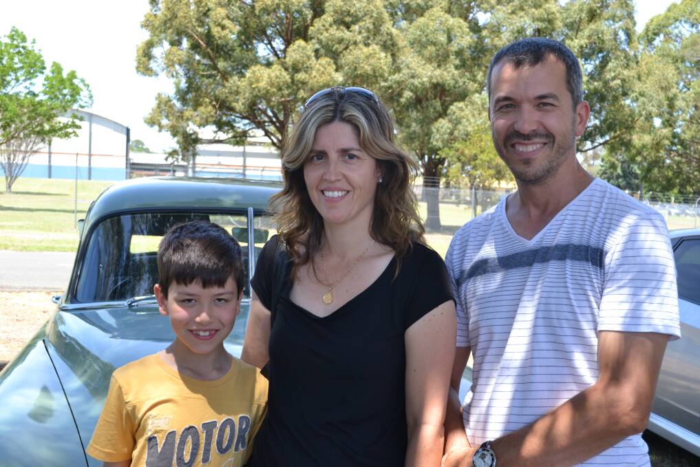 ADMIRING THE CARS: Basin View residents Carmen and John Coelho with son Logan. 