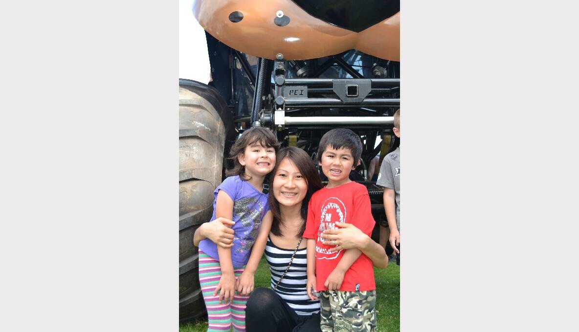 MONSTER TRUCKS: Kayleigh, Tingting and Liam Atlee from Sanctuary Point pictured at the Monster Trucks Family Spectacular on Saturday.