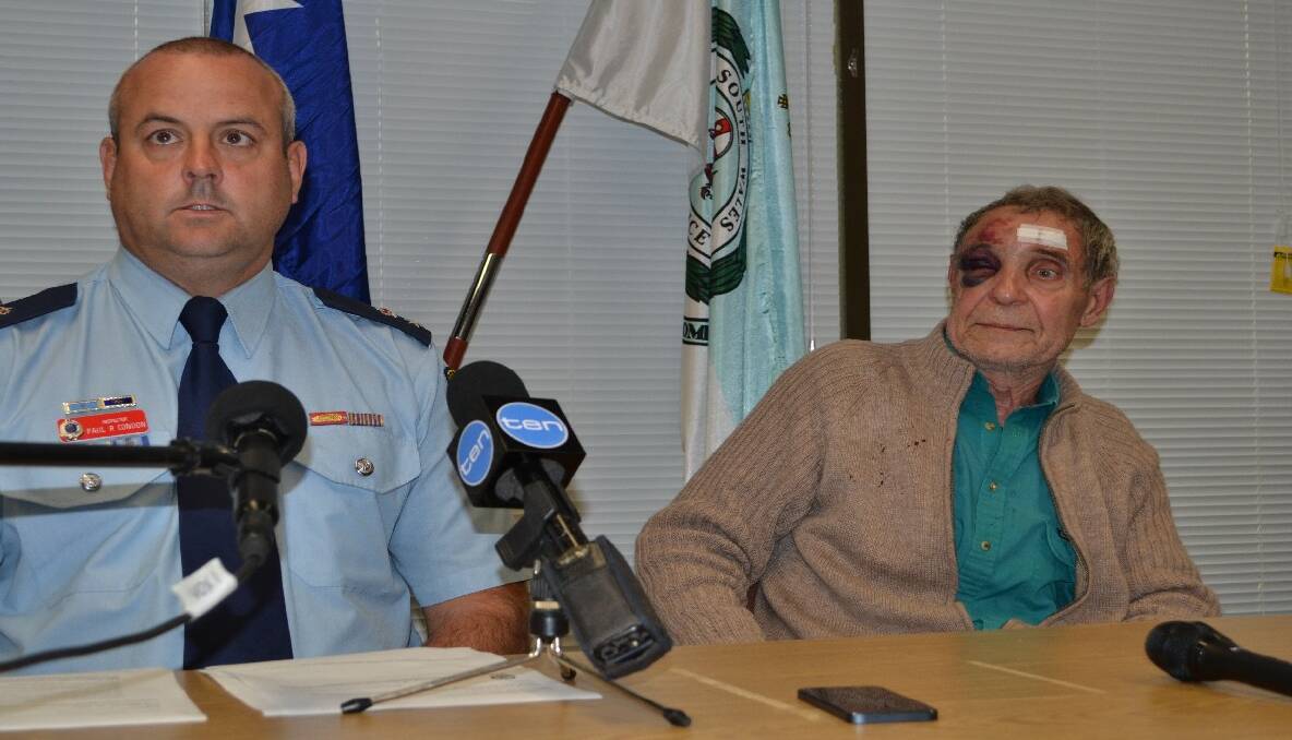 A battered and bruised Francois Beugels with acting Shoalhaven Local Area Commander, Acting Superintendent Paul Condon.