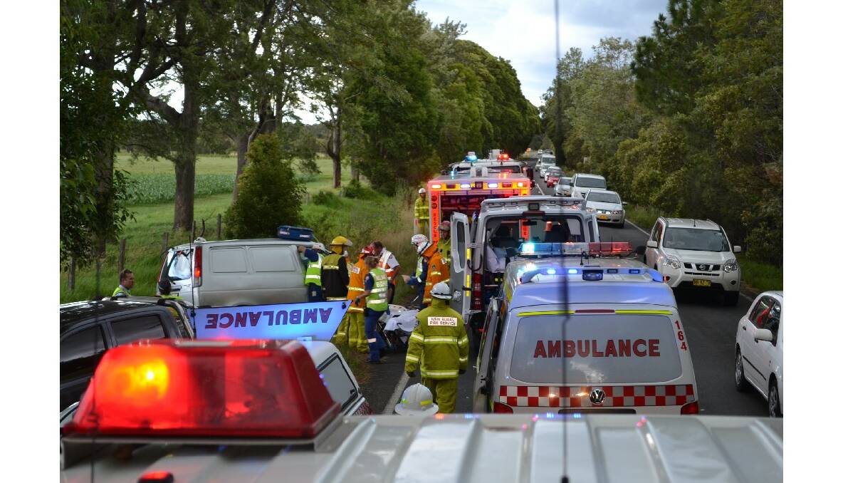 Local emergency rescue crews work to free a Nowra woman who was injured in a head on accident on Bolong Road on Thursday afternoon.