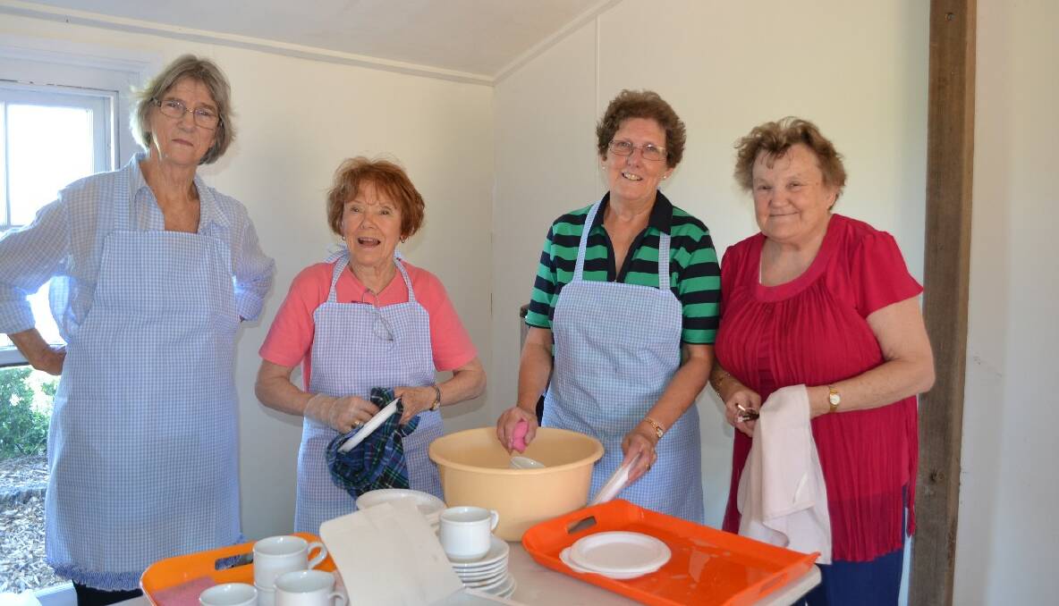 Hard working members of the Nowra Presbyterian Women’s Association at the 1000 Roses Beautiful Garden morning tea, Elizabeth Connolly, Noni Rogan, Liz Vercoe and Norma Weatherall.