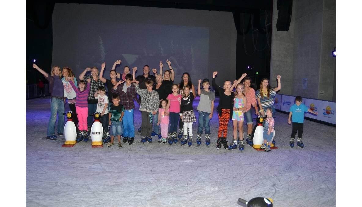 Participants in the opening session of Ice Escape at the Shoalhaven Entertainment Centre have a great time on the ice.