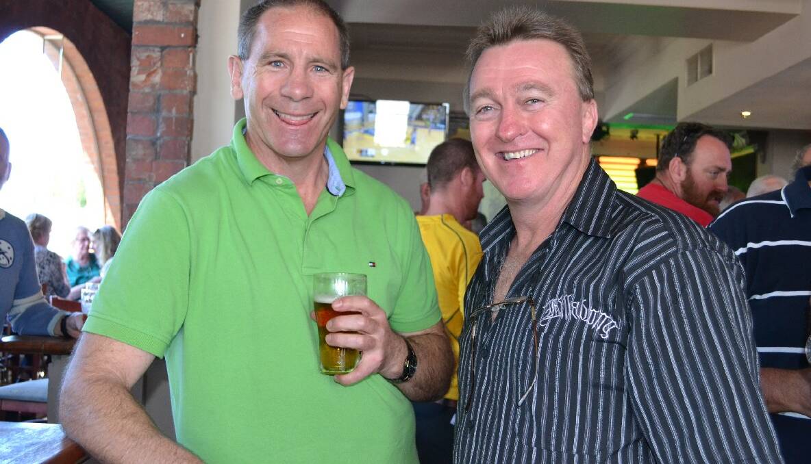 Dave Cunningham and Rick Meehan catch up at the reunion.