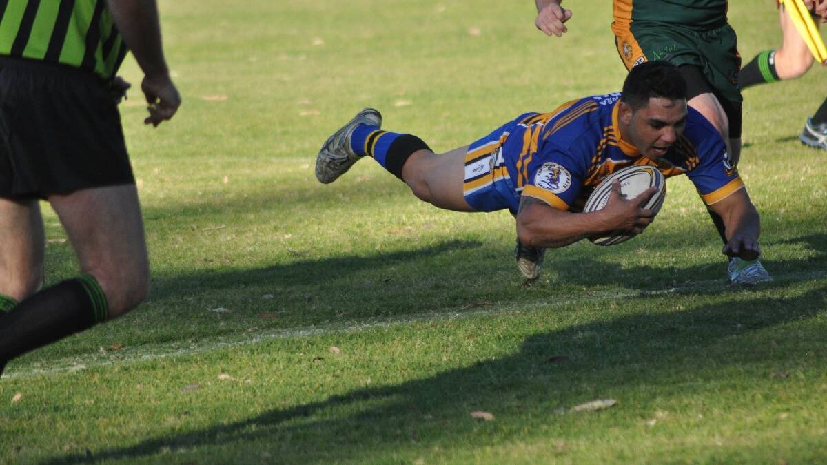 NOWRA: Nowra-Bomaderry Jets player Arthur Scott scores a try to put them back in the lead. The Jets beat Albion Park 42-30 at Nowra Showground.