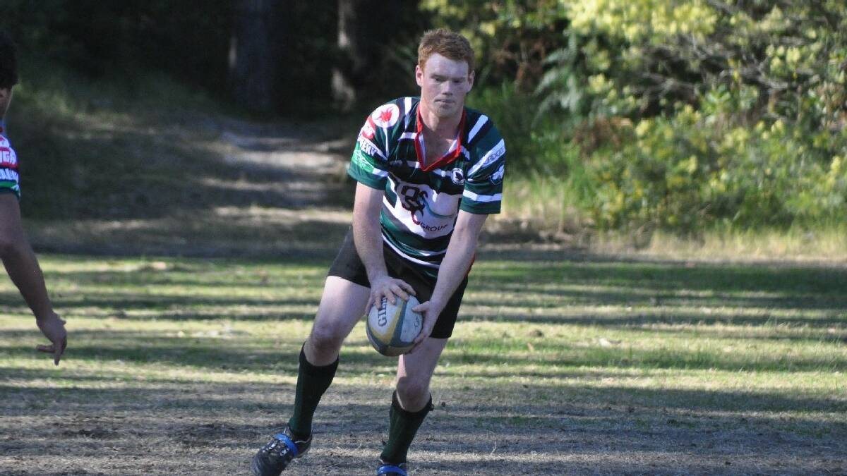  NAROOMA: The Narooma Whales player Sean Stenhouse in action against Broulee on the weekend. Stenhouse was named the South Coast Rugby Union’s  Best and Fairest for 2013.